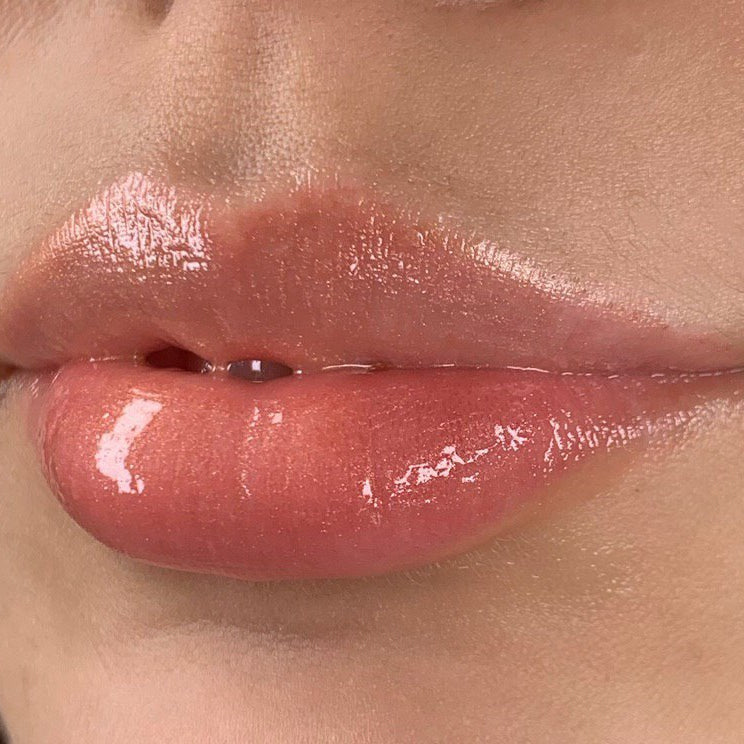 Glossy fresh lip blush with a FACE Apricot and Caramel pigment mix