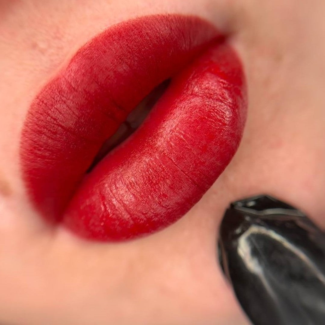 Rich red lip PMU with a FACE Bellucci and Toffee pigment mix