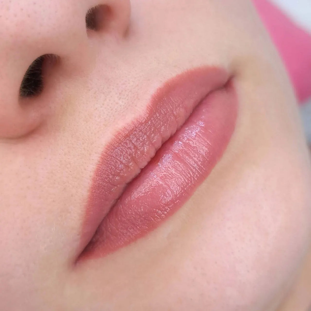 Lip permanent makeup done with Hanafy Soft Beige lip pigment