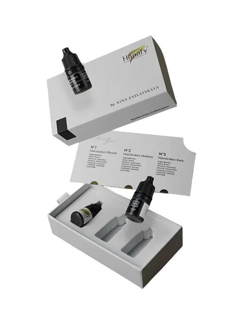PMU Master Boutique Hanafy Hairstrokes Set with three eyebrow pigments in a white presentation box for hair strokes.